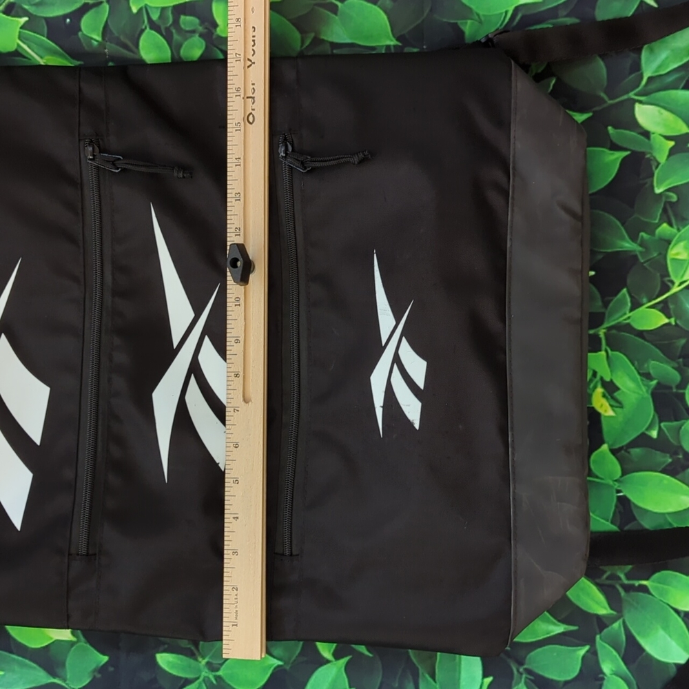Black Reebok Backpack With Unique Tiered Zipper Pocket Design - Picture 12 of 15
